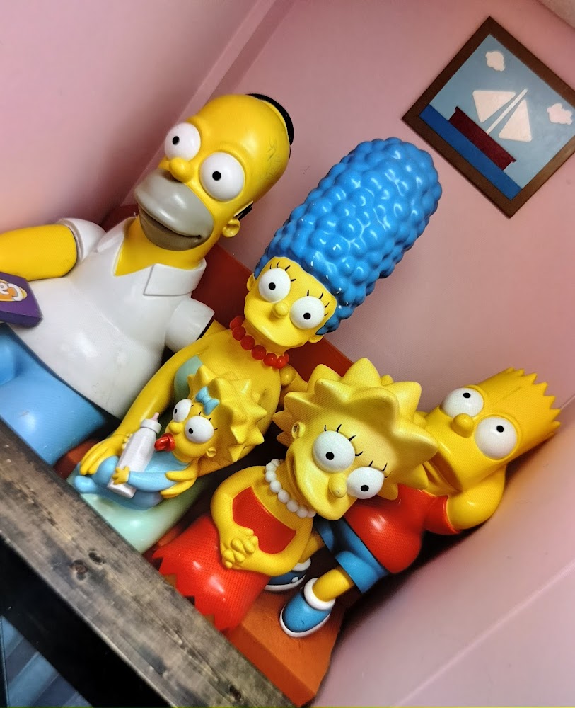Real Simpsons family statues in the Crazy Gator Pizza lobby